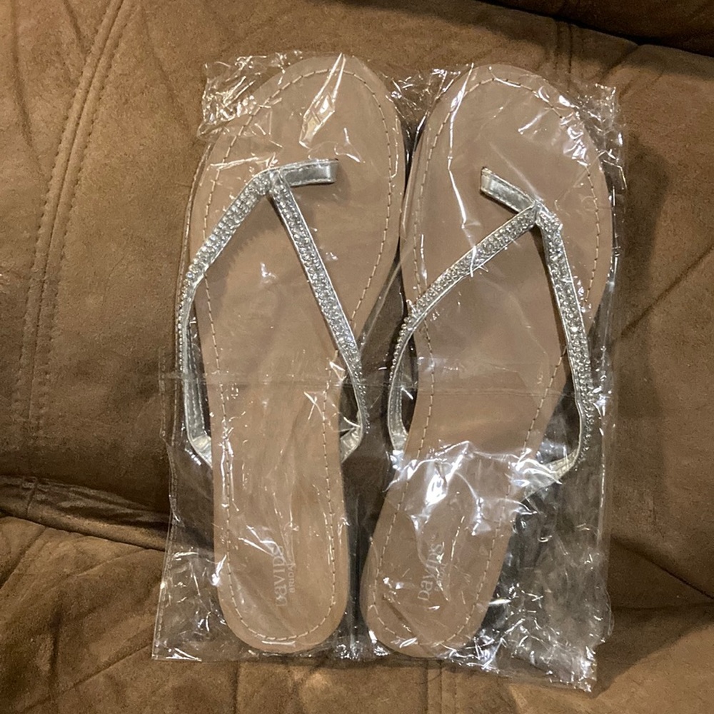 2 different pairs size 8 and size 11: crystal flip flops